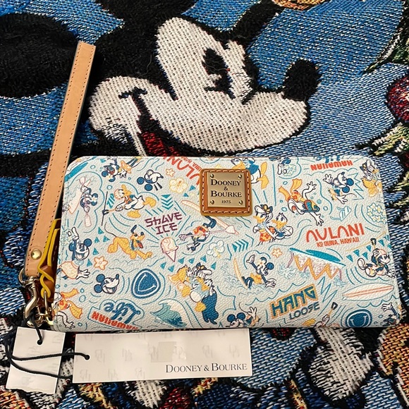 Dooney & Bourke Handbags - Disney Dooney and Bourke Aulani wallet! Brand new with the tag!!!